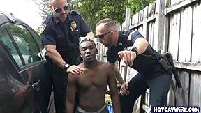 Police Officers Dominate Black Guy in Raw Interracial Threesome Action!