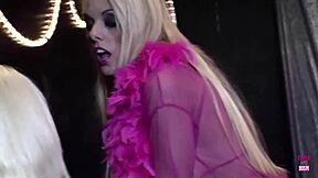 Two seductive blonde women indulge in oral pleasure and enjoy a sex toy together