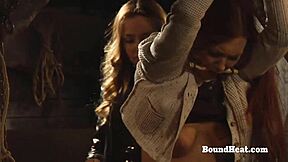 A dominate lesbian lady bound and pleasuring herself intensely