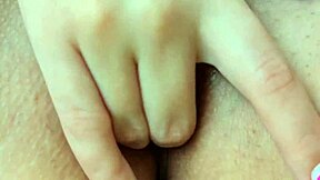 Close-up of petite Asian brunette's self-pleasure session with manicured fingers