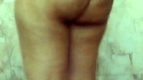 Amateur Indian girl pleasures herself in bathroom with dirty Hindi dialogue