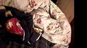 A voluptuous brunette pleasures herself with a sex toy while arousing her partner's cock