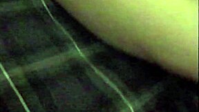 A voluptuous brunette pleasures herself with a sex toy while arousing her partner's cock
