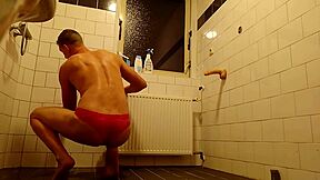 Young gay lad washing in underwear