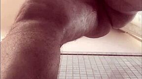 Using a large ebony phallus for pleasure