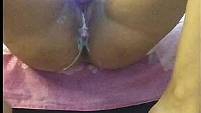 A young girl indulges in solo pleasure and liberally applies lotion to her curves