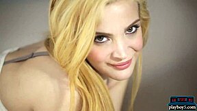 Two attractive models with blonde hair undress completely for a tantalizing striptease