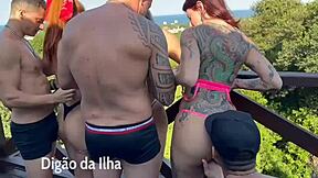 Three naughty individuals engage in steamy sexual acts on the outdoor balcony, featuring a stunning redhead and culona with a perfect ass.