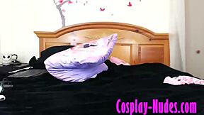 A young and petite cosplay girl undresses and masturbates in a steamy video