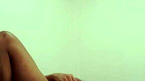 Young gay man indulges in whipped cream play in bedroom