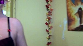 Shemale gets sprayed with cream in a group setting