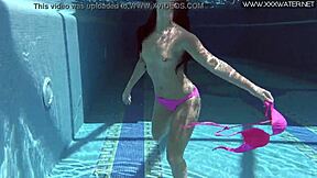 Brunette bombshell Jessica Lincoln takes a sensual bath underwater