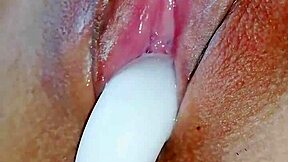Asian babe enjoys anal play with butt plug