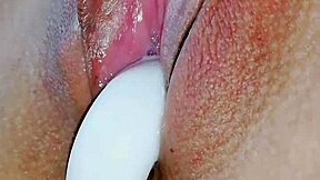 Asian babe enjoys anal play with butt plug