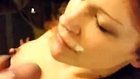 A lovely ginger gets covered in cum