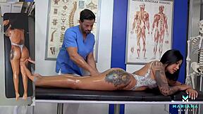 Physiotherapist Mariana Martix massages Nick Moreno's back before riding his big black cock