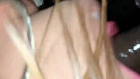 A stunning white transgender person performs oral sex on a young black man
