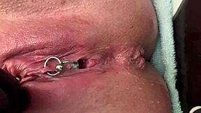 Intense stream of pee from my pierced pussy while fingering and wearing latex gloves