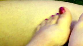 My spouse performs a footjob on me with a steamy finish, including a cumshot on her painted toenails