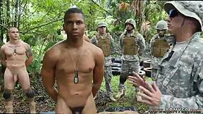 Young men engage in gay sex in a jungle setting