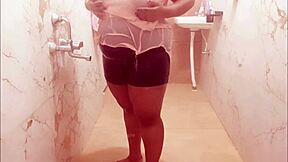Indian maid flaunts her busty assets while cleaning