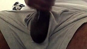 Black man strokes his big cock for solo pleasure