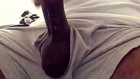 Black man strokes his big cock for solo pleasure