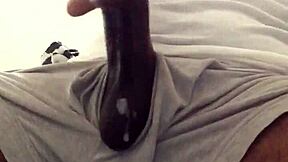 Black man strokes his big cock for solo pleasure