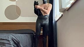 Donning a latex catsuit from the collection for a rubbery sensation