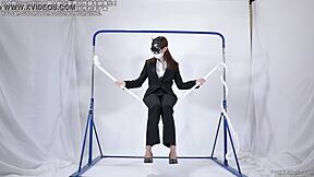 A woman pleasuring herself with a rope fetish