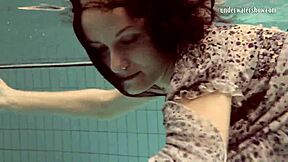 European beauty Loris Licicia swims naked in the pool
