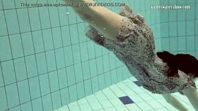 European beauty Loris Licicia swims naked in the pool