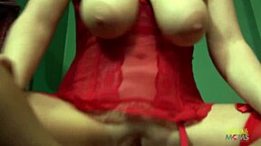 A busty woman performs a blowjob before engaging in anal intercourse on a couch