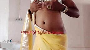 Lara Dsouza's sizzling shemale performance in Indian crossdresser video