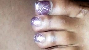 Footjob and penis stimulation combined