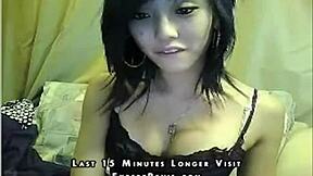Amateur Asian cam girl shows off her solo skills