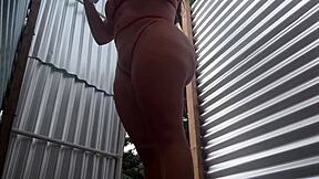 Public exposure of dressed woman's rear end