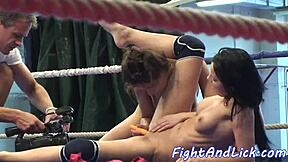 Lesbian wrestling match turns into sensual pussy play