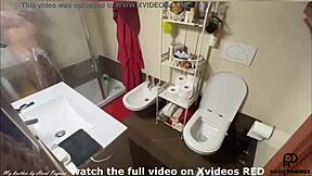 Amateur gay watches himself in the shower and masturbates