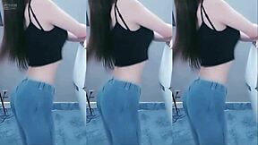 A Chinese girl's sensual dance with a vibrating toy
