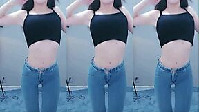 A Chinese girl's sensual dance with a vibrating toy