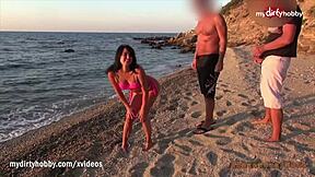 Steamy outdoor encounter with attractive brunette MILF getting passionately fucked on the beach