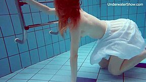 Diana, the seductive brunette, flaunts her ample backside and bosom