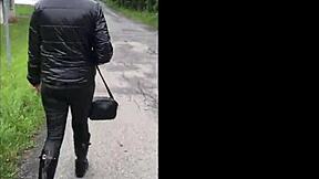 Wife in Hunter Wellies and Tight Leather Leggings Filmed Outdoors on Smartphone