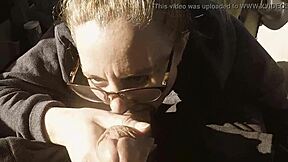 Nerdy stud pleasures himself in a parking lot and smears his own semen