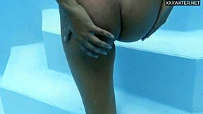 Irina Cage, a petite blonde, enjoys nude swimming as a mix of Russian and Spanish heritage
