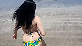 My petite girlfriend enjoys showing off her ass on beach vacations