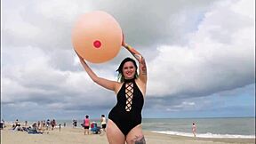 Stunning women in bikinis at a beach photo shoot