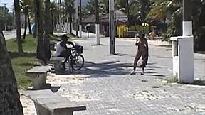 Beach beauty Amador reveals her big ass and small pussy in a steamy strap-on show