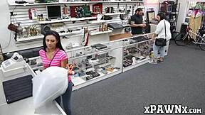 A stunning woman receives intense penetration from a pawnshop owner at his workplace
